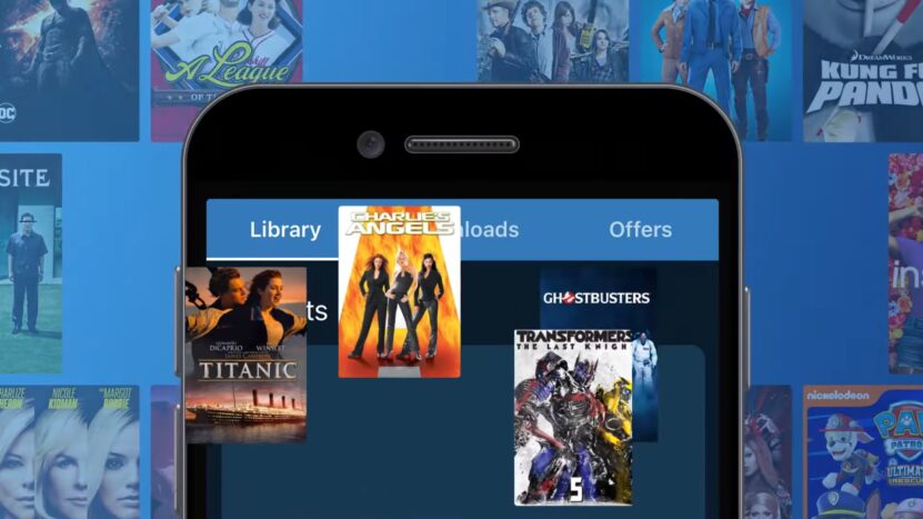 Close-up view of a mobile interface showing movie titles Titanic, Charlie's Angels, and Transformers on the Vudu streaming platform